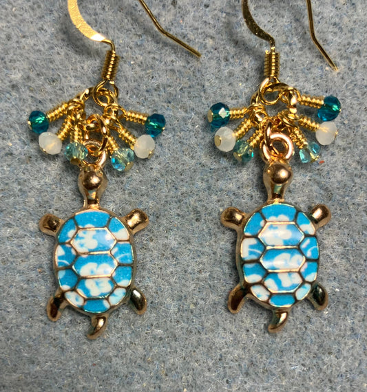 Turquoise and white enamel turtle charm earrings adorned with tiny dangling turquoise and white Chinese crystal beads.