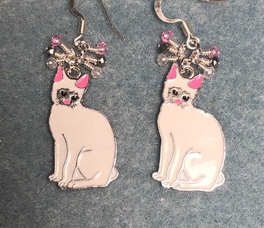 White and pink enamel cat charm earrings adorned with tiny dangling white, silver, and punk Chinese crystal beads.