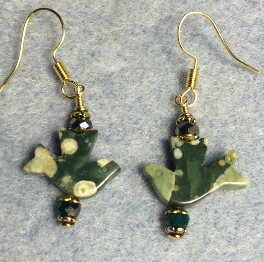 Rhyolite gemstone flying dove bead earrings adorned with green Chinese crystal beads.