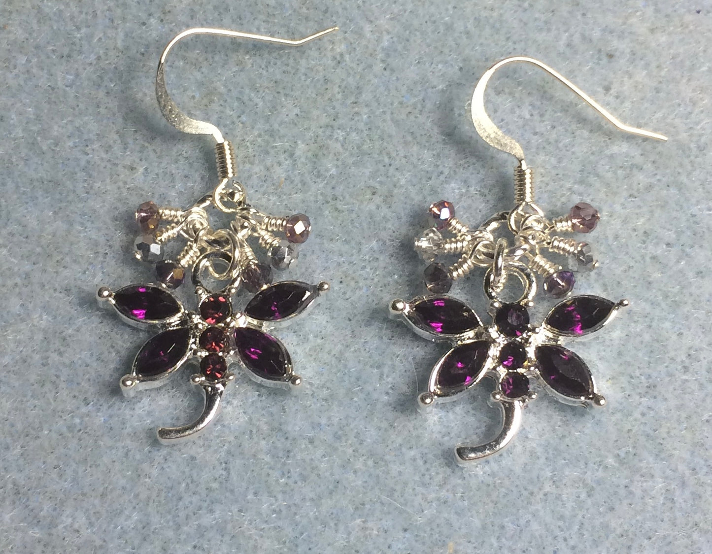 Purple and silver rhinestone dragonfly charm earrings adorned with tiny dangling purple and silver Chinese crystal beads.