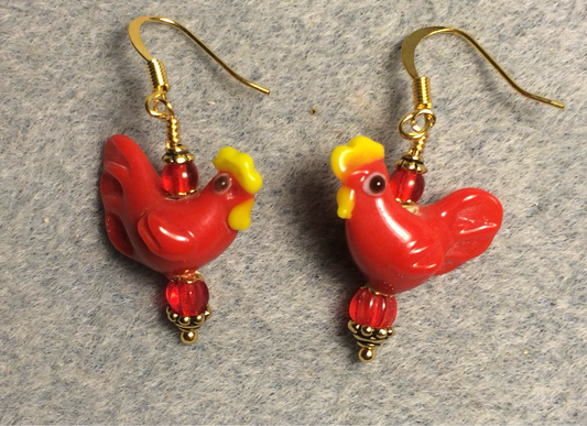 Bright red lamp work chicken bead earrings adorned with red Czech glass beads.