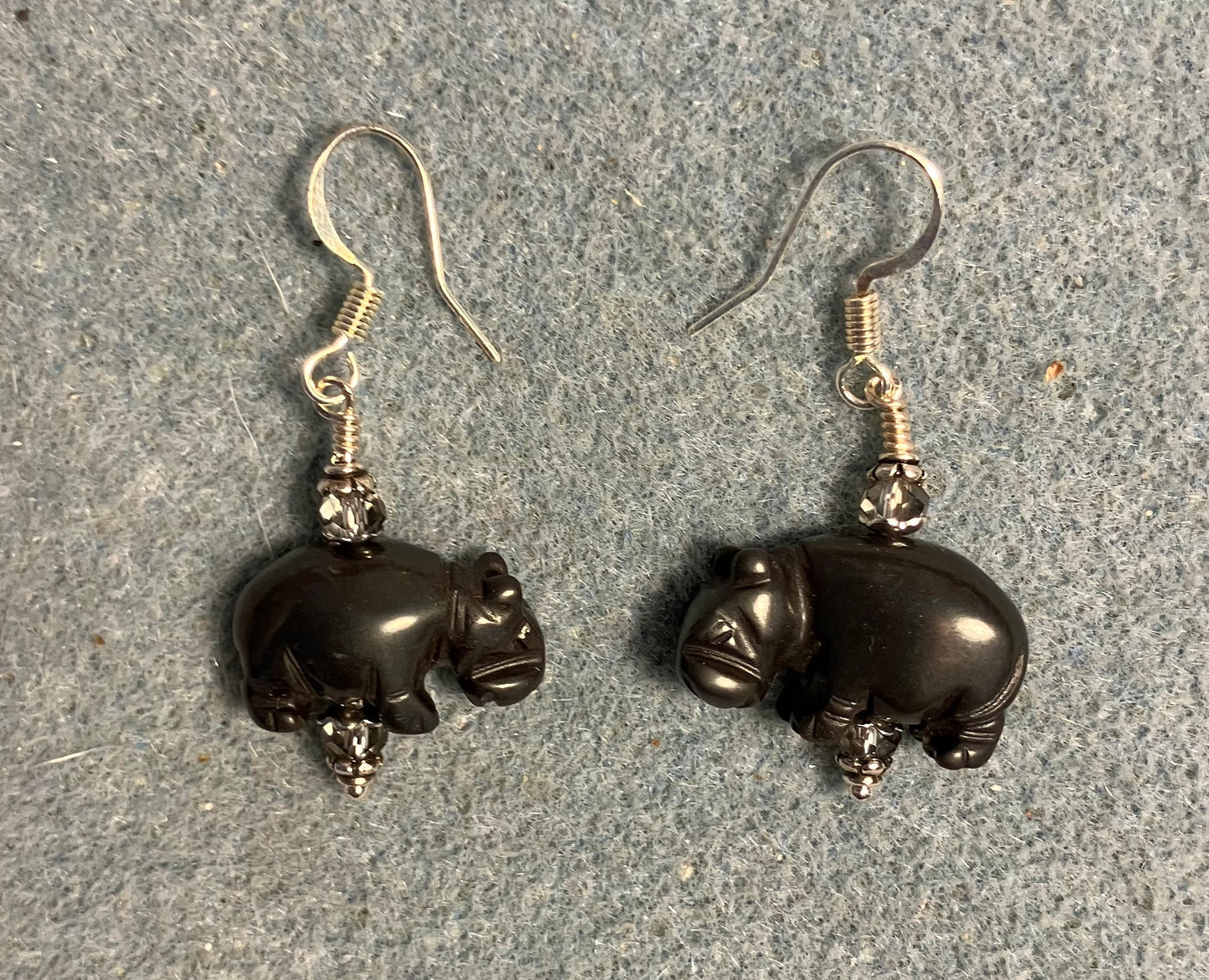 Gray hematite gemstone hippo bead earrings adorned with gray Chinese crystal beads.