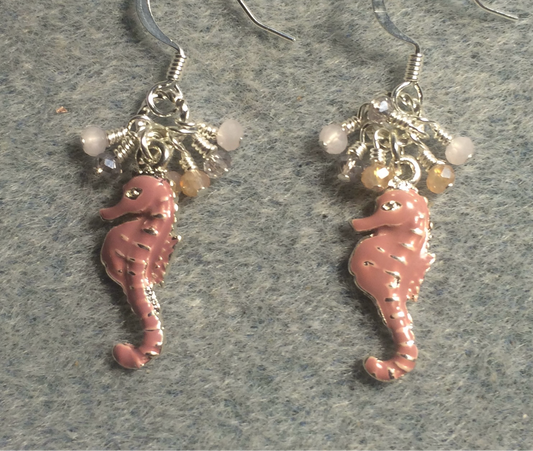 Peach pink enamel seahorse charm earrings adorned with tiny dangling peach, pink, and clear Chinese crystal beads.