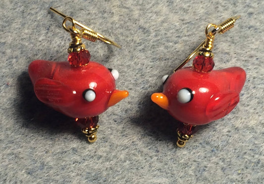 Small opaque red lamp work cardinal bird bead earrings adorned with red Chinese crystal beads.
