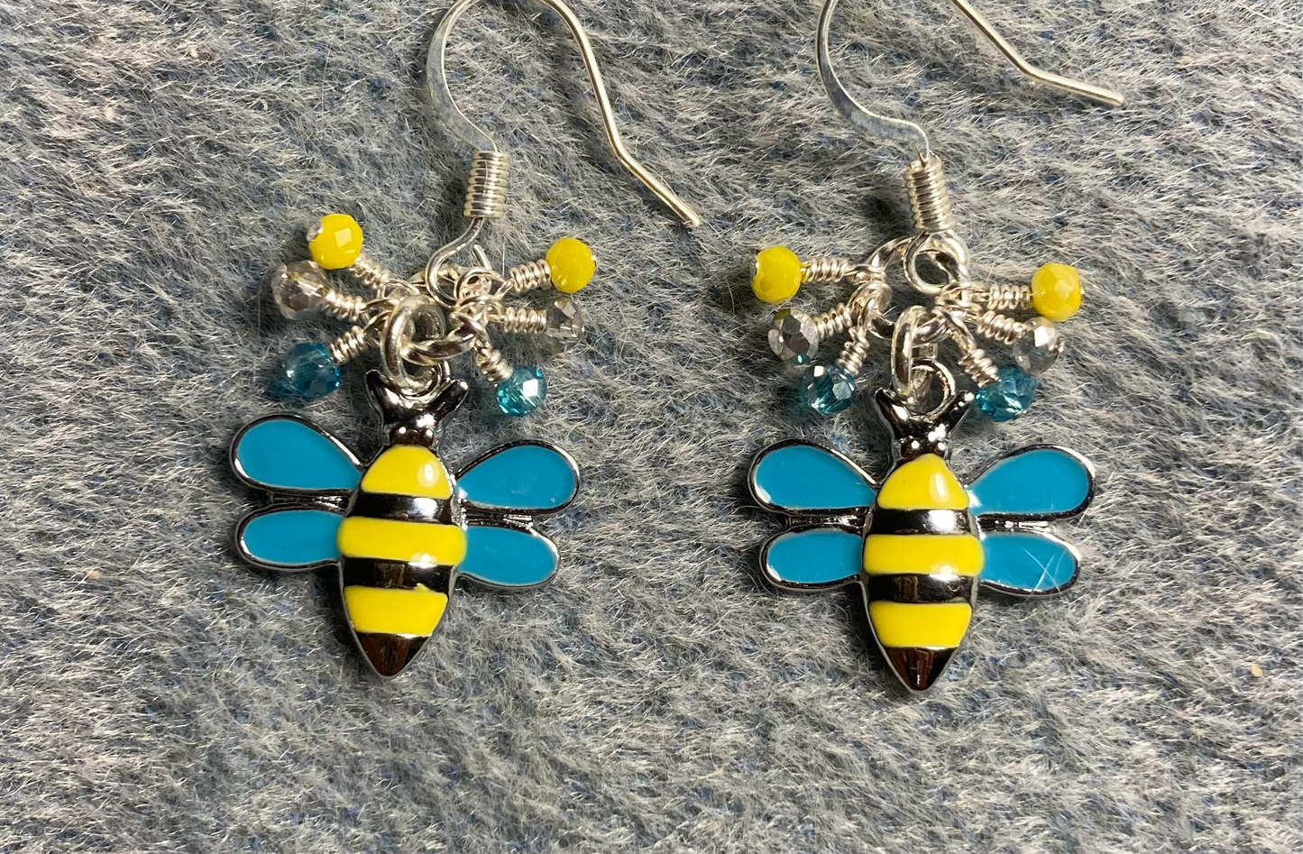 Yellow, turquoise, and silver enamel honeybee charm earrings adorned with tiny dangling yellow, turquoise, and silver Chinese crystal beads.