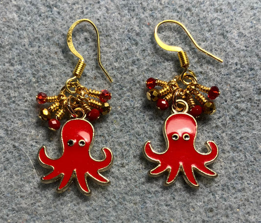 Red and gold enamel octopus charm earrings adorned with tiny dangling red and gold Chinese crystal beads.