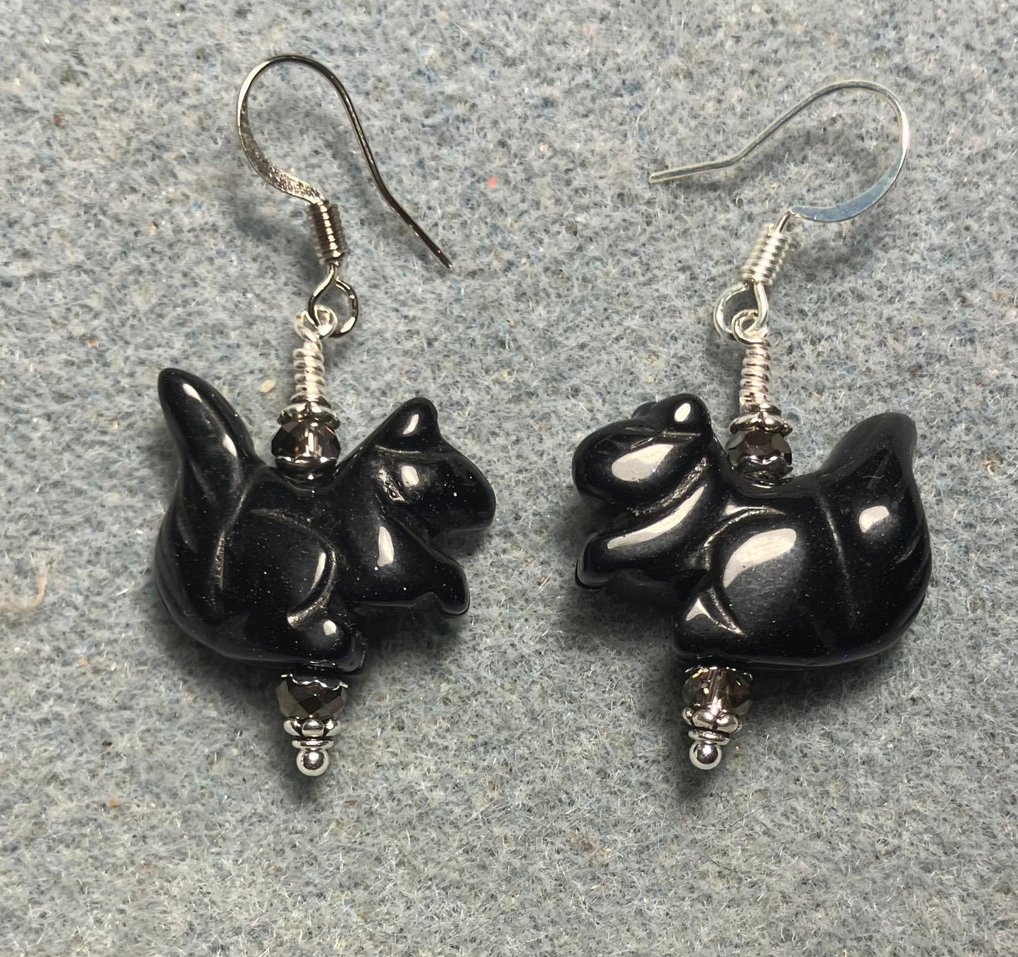 Blue goldstone gemstone squirrel bead earrings adorned with purple Chinese crystal beads.