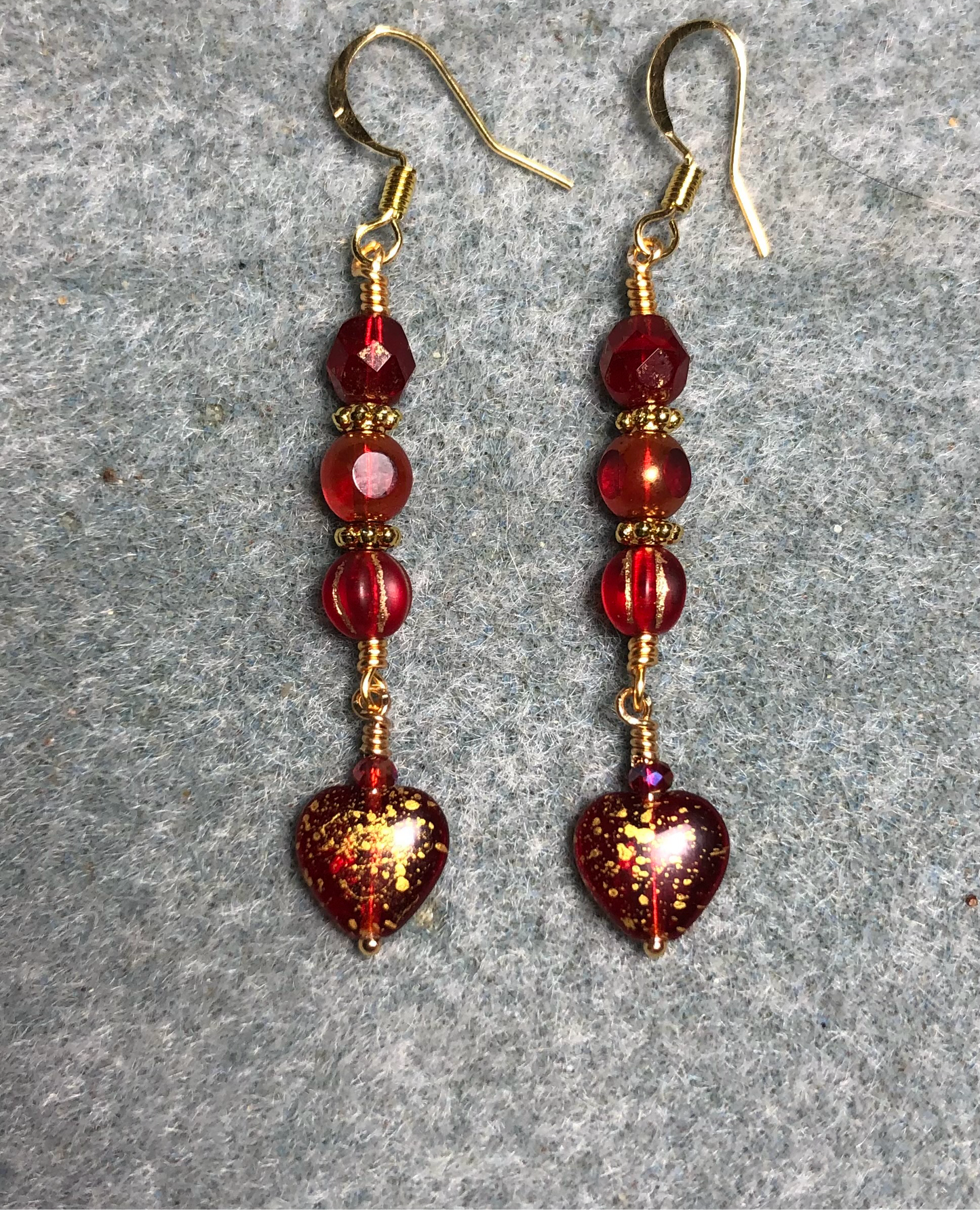Small bright red with gold speckles Czech glass heart bead earrings adorned with reddish gold Czech glass beads.