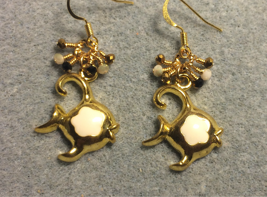 Gold and off white enamel angelfish charm earrings adorned with tiny dangling gold and off white Chinese crystal beads.