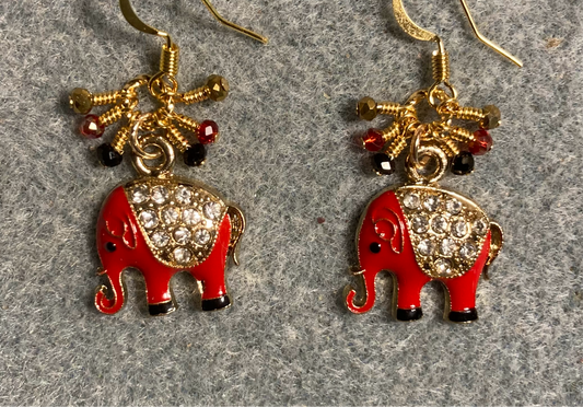 Red enamel and colorful rhinestone elephant charm earrings adorned with tiny dangling red, black, and gold Chinese crystal beads.