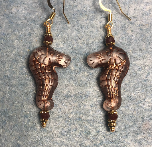 Tan (with brown inlay) Czech glass seahorse bead earrings adorned with brown Chinese crystal beads.