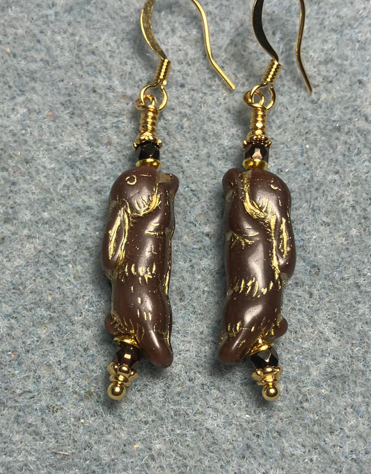 Small brown (with gold inlay) Czech glass bunny rabbit bead earrings adorned with small brown Czech glass beads.