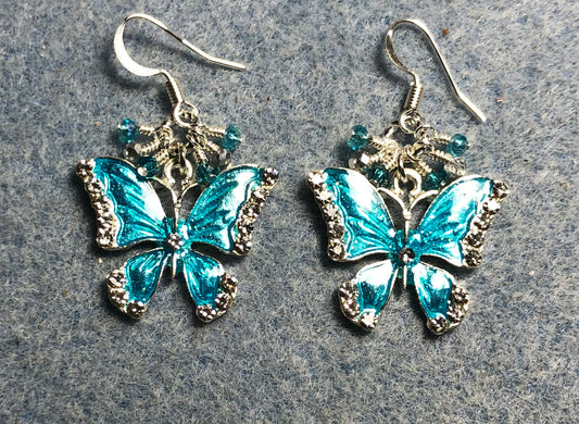 Silver and turquoise enamel and rhinestone butterfly charm earrings adorned with tiny dangling turquoise and silver Chinese crystal beads.