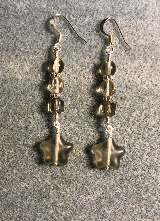 Small translucent gray Czech glass star bead earrings adorned with gray Czech glass beads.