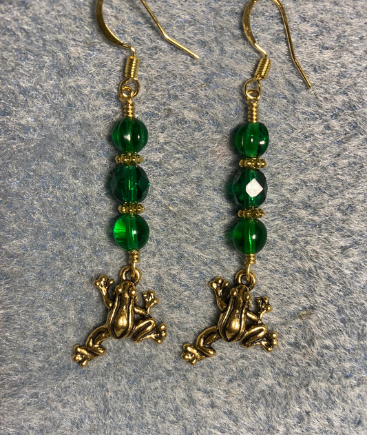 Gold Tierracast frog charm earrings adorned with emerald green Czech glass beads