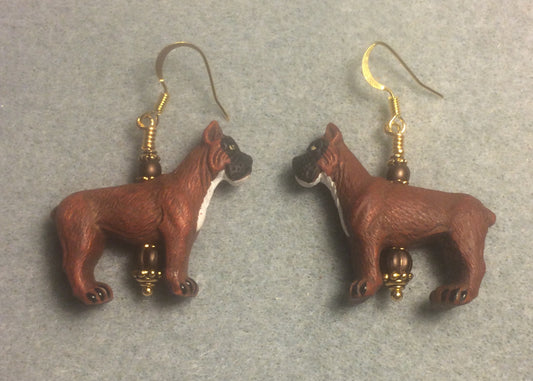 Brown, black, and white ceramic boxer bead earrings adorned with brown Czech glass beads.
