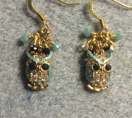Small gold and rhinestone owl charm earrings adorned with tiny dangling aqua, black, and clear Chinese crystal beads.
