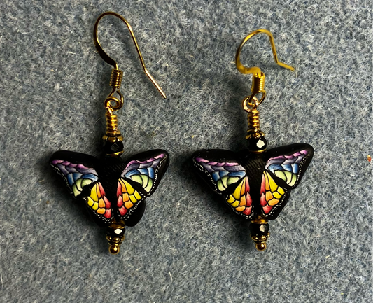 Multicolored polymer clay butterfly bead earrings adorned with black Chinese crystal beads.