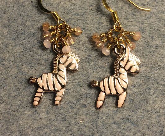 Peach and gold enamel striped zebra charm earrings adorned with tiny dangling peach and pink Chinese crystal beads.