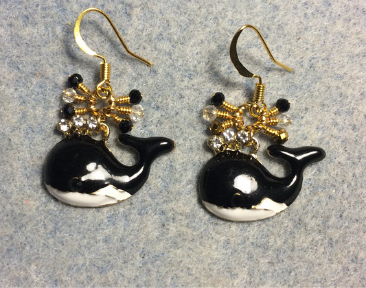 Black and white enamel and rhinestone whale charm earrings adorned with tiny dangling black and clear Chinese crystal beads.