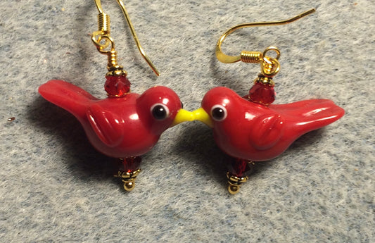 Opaque red lamp work songbird bead earrings adorned with red Chinese crystal beads.
