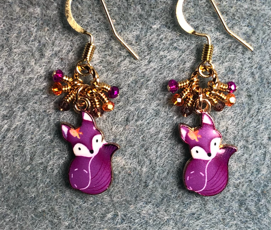 Small purple and orange enamel fox charm earrings adorned with tiny dangling purple and orange Chinese crystal beads.