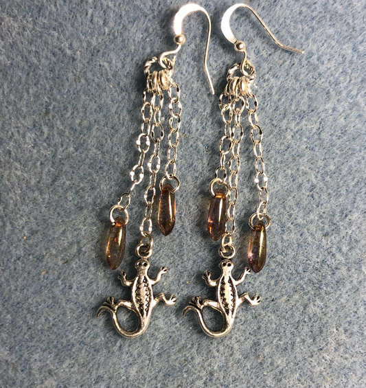 Small silver lizard charm earrings attached to silver chain and adorned with small brown Czech glass dagger beads