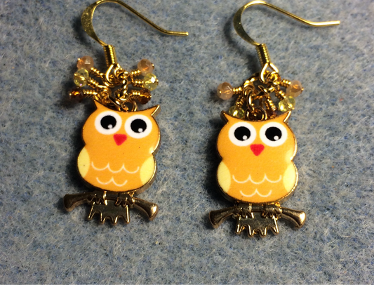Orange, yellow, and white enamel owl charm earrings adorned with tiny dangling orange, yellow, and amber Chinese crystal beads.