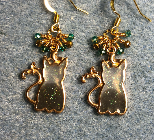 Green gray and gold sparkly resin cat charm earrings adorned with small dangling teal and gold Chinese crystal beads.