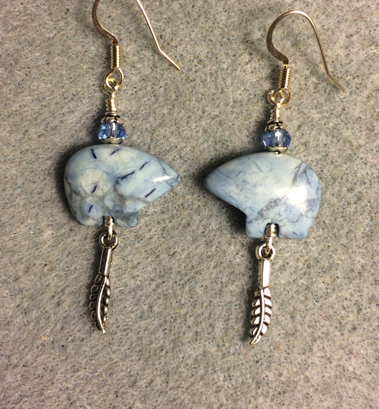 Light blue lapis lazuli gemstone Zuni bear fetish bear earrings adorned with light blue crystal beads and tiny silver feather charms.