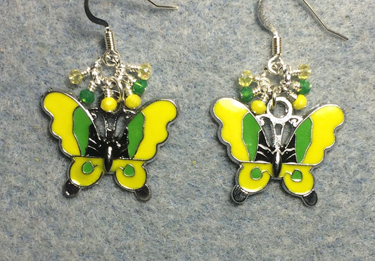 Yellow and green enamel butterfly charm earrings adorned with tiny dangling yellow and green Chinese crystal beads.