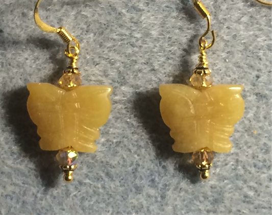 Yellow quartz gemstone butterfly bead earrings adorned with amber Chinese crystal beads.