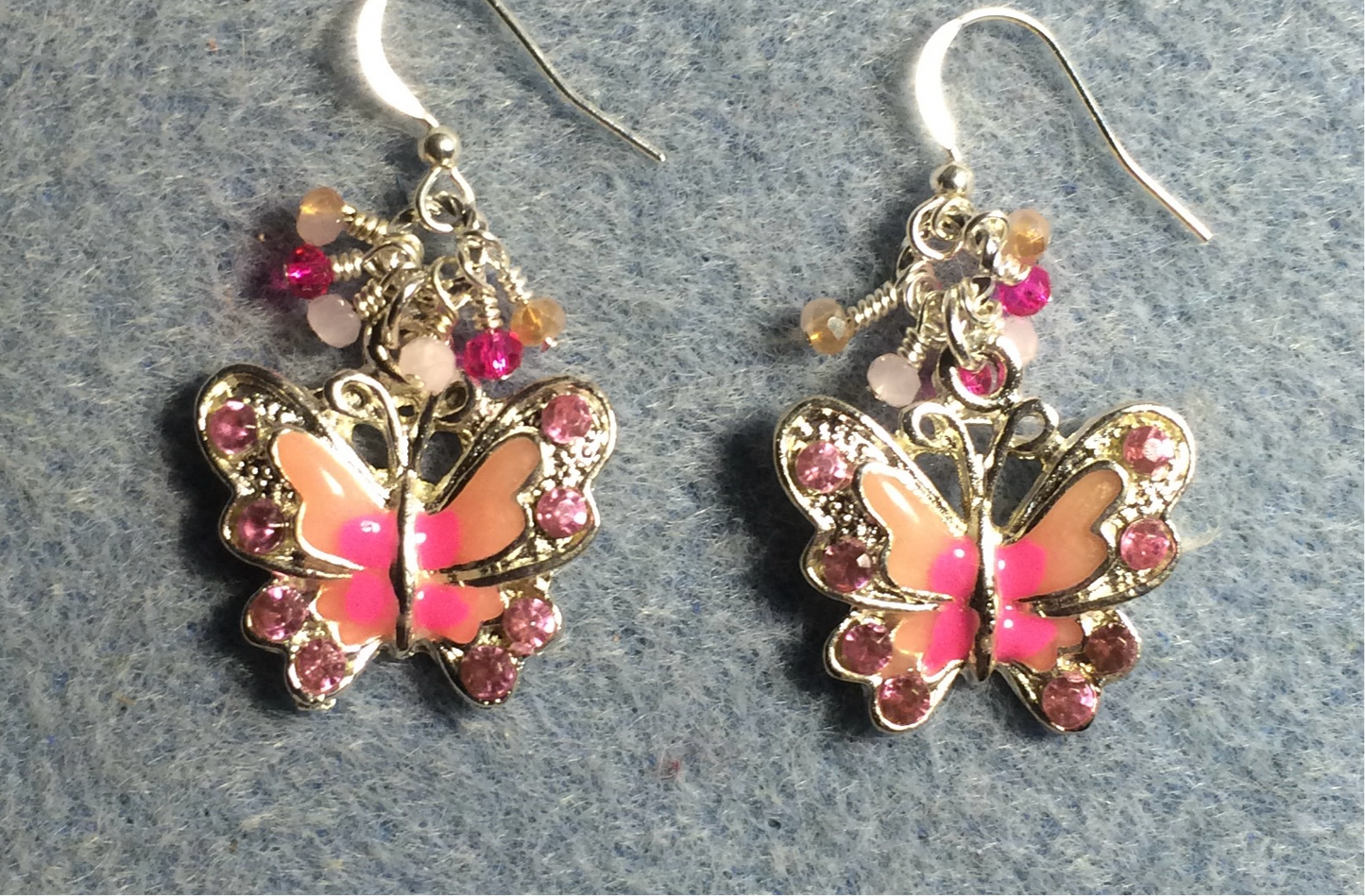 Silver, pink, and peach enamel and rhinestone butterfly charm earrings adorned with tiny dangling pink and peach Chinese crystal beads.