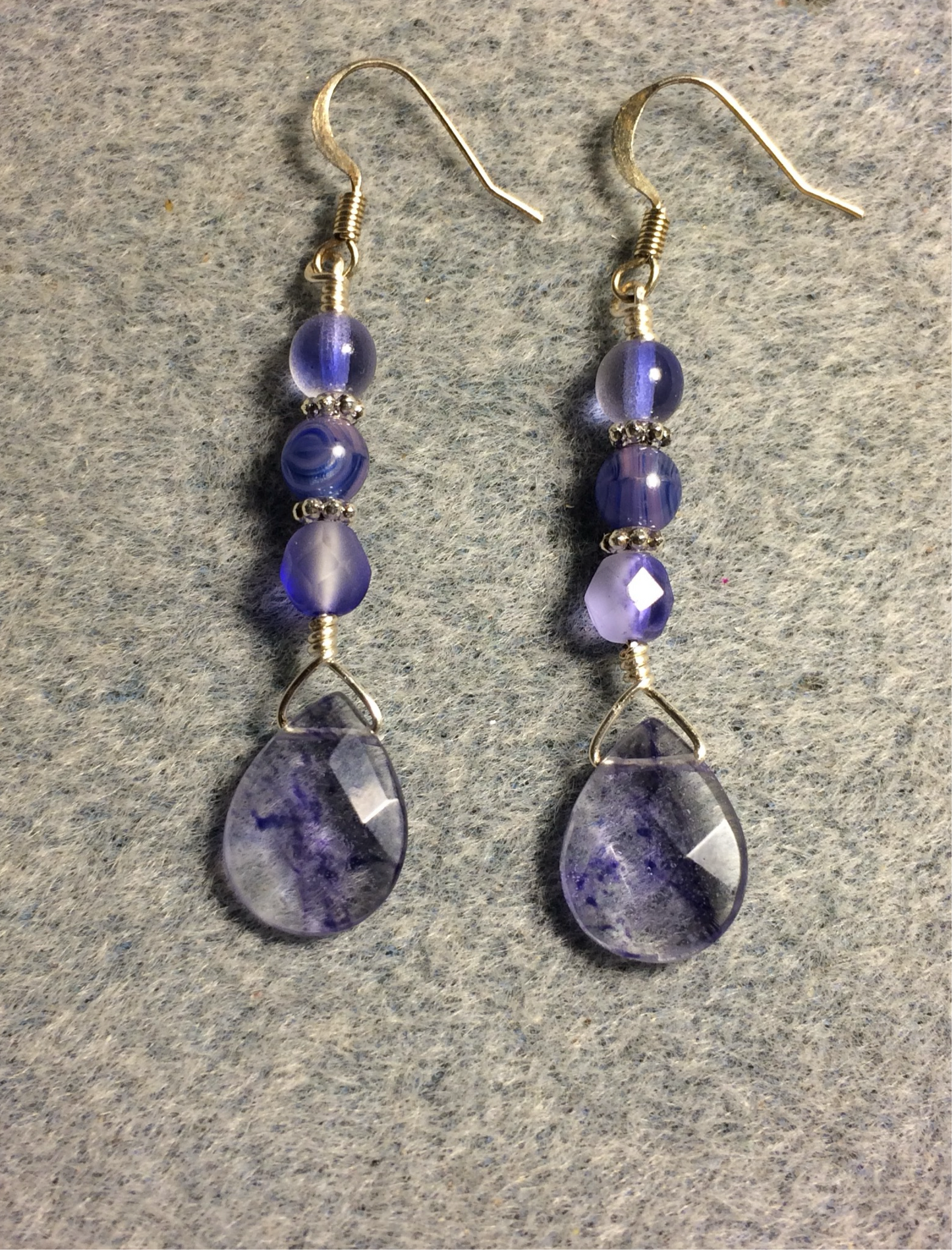 Blue purple mottled Czech glass briolette bead earrings adorned with blue purple Czech glass beads.