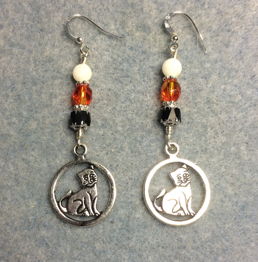 Silver cat charm earrings adorned with black, orange, and white Czech glass beads