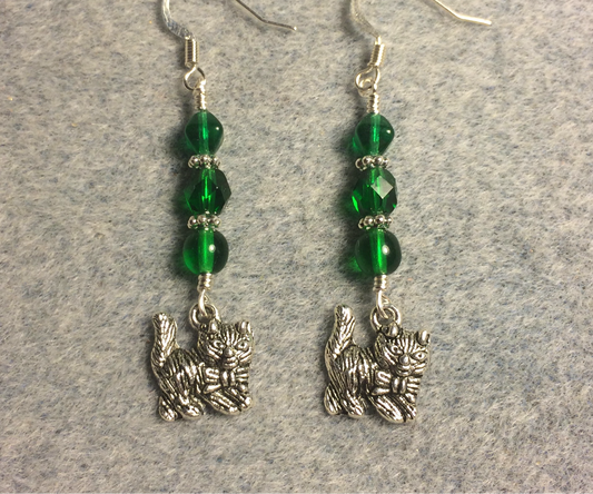 Silver cat charm earrings adorned with emerald green Czech glass beads