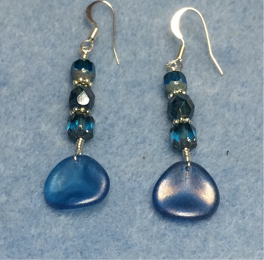 Blue Czech glass rose petal earrings adorned with blue Czech glass beads.