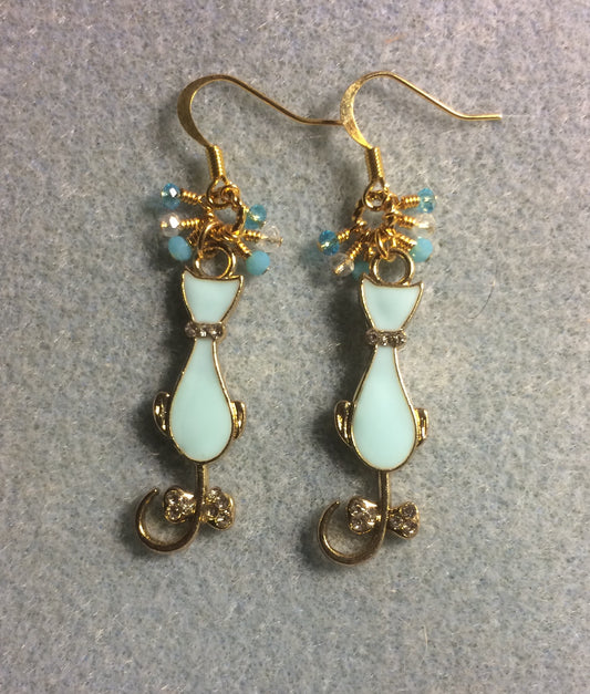Aqua and gold enamel cat charm earrings adorned with tiny dangling aqua, clear, and turquoise Chinese crystal beads.