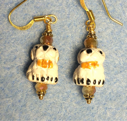 Small white and beige ceramic puppy dog bead earrings adorned with tan Chinese crystal beads.
