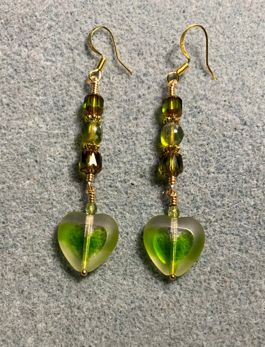Olive green Czech glass heart bead earrings adorned with olive green Czech glass beads.