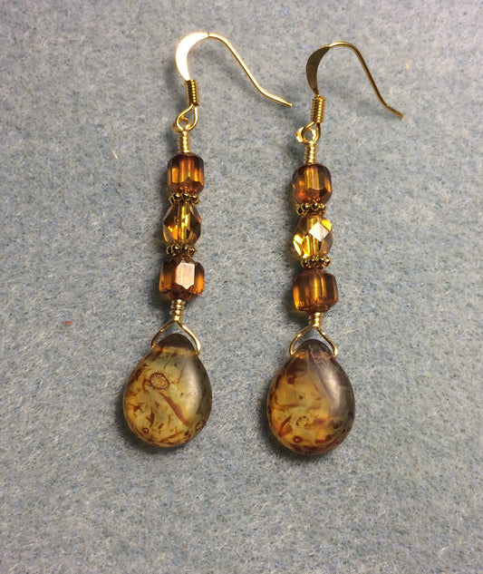 Amber brown Czech glass pear drop bead earrings adorned with dark amber Czech glass beads.