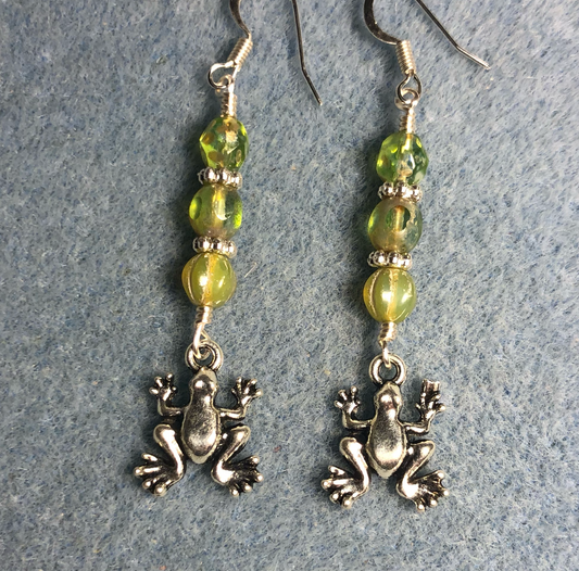 Small silver frog charm earrings adorned with small light green Czech glass beads