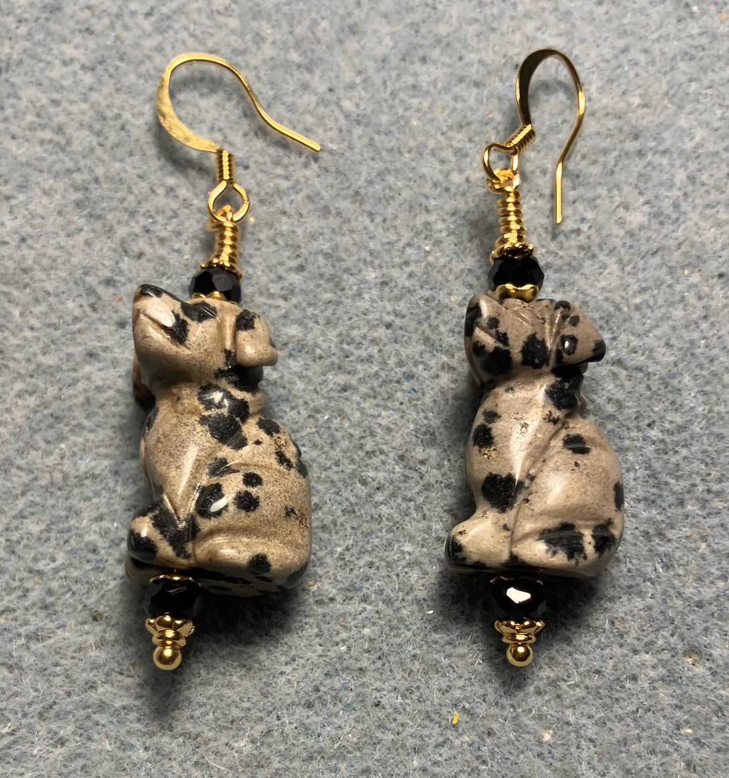 Dalmatian jasper gemstone dog bead earrings adorned with black Chinese crystal beads.