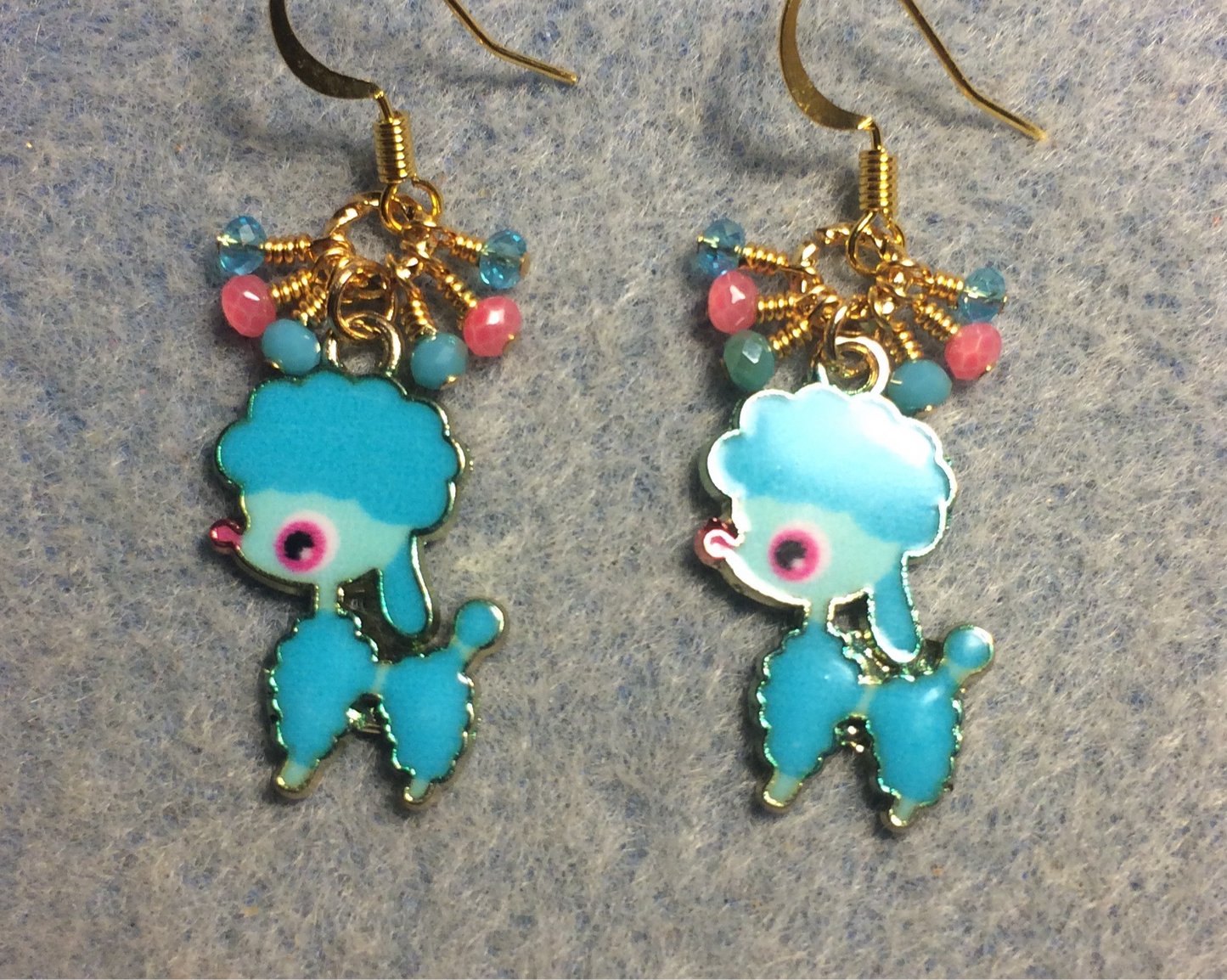 Turquoise and pink enamel poodle charm earrings adorned with tiny dangling turquoise and pink Chinese crystal beads.