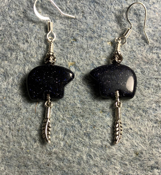 Blue goldstone gemstone Zuni bear fetish bear earrings adorned with purple crystal beads and tiny silver feather charms.