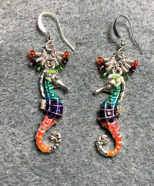 Orange, purple, and olive green enamel seahorse charm earrings adorned with tiny dangling orange, purple, and olive green Chinese crystal beads.