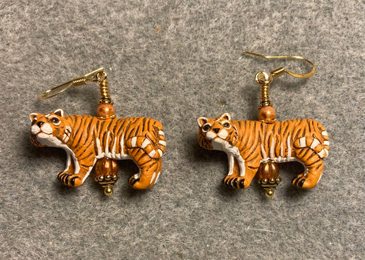 Orange ceramic striped tiger bead earrings adorned with orange Czech glass beads.