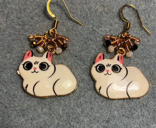 White, black, and pink enamel cat charm earrings adorned with tiny dangling white, black, and pink Chinese crystal beads.