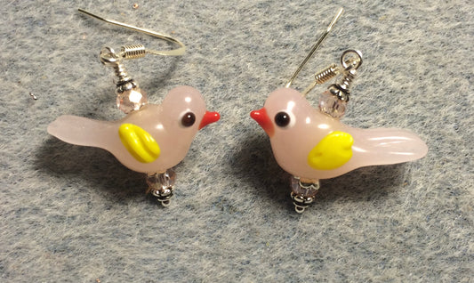 Milky pink and yellow lamp work songbird bead earrings adorned with pink Chinese crystal beads.
