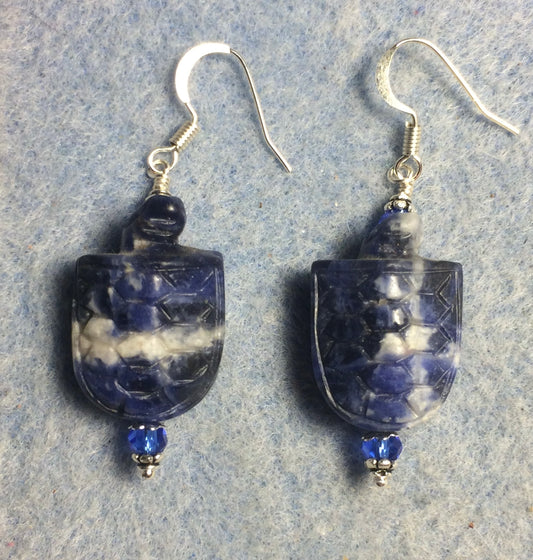 Blue sodalite gemstone turtle bead earrings adorned with dark blue Chinese crystal beads.